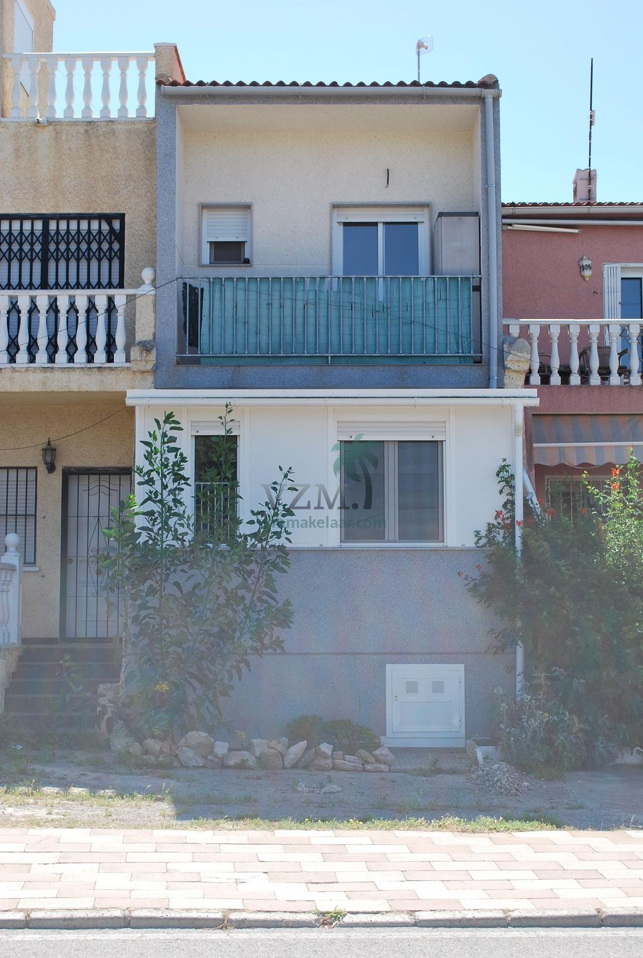 Leuke bestaande tussenwoning in de urbanisatie La Marina - VZM Makelaar